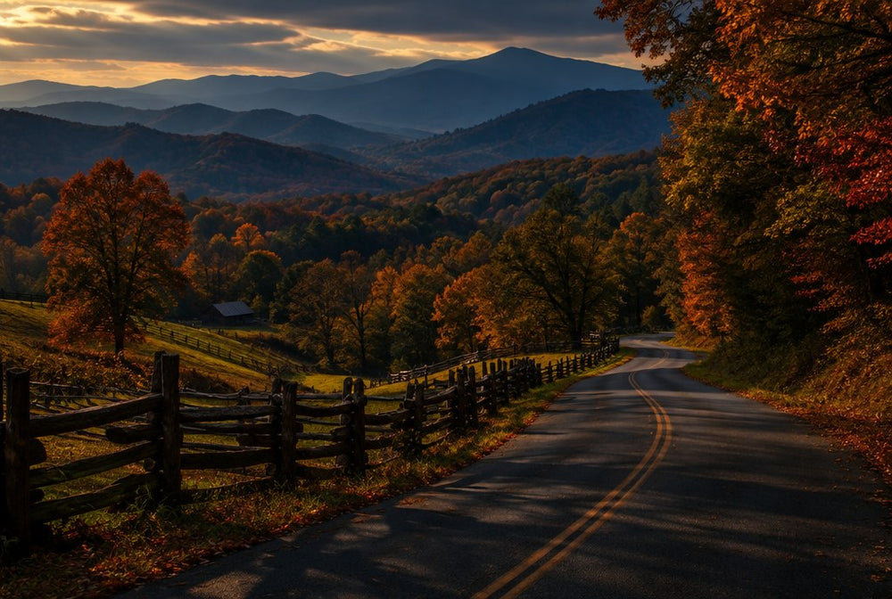 A country road through autumn foothills with blue mountain ridges in East Tennessee